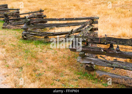 Rustic western-style zig-zag wooden fence seen on Salt Spring Island, BC, Canada Stock Photo