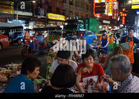 Restaurants and nightlife in Thanon Yaowarat road at night in central Chinatown district of Bangkok Thailand. Yaowarat and Phahu Stock Photo