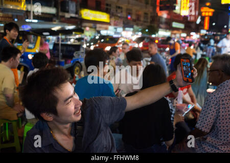 Restaurants and nightlife in Thanon Yaowarat road at night in central Chinatown district of Bangkok Thailand. Yaowarat and Phahu Stock Photo