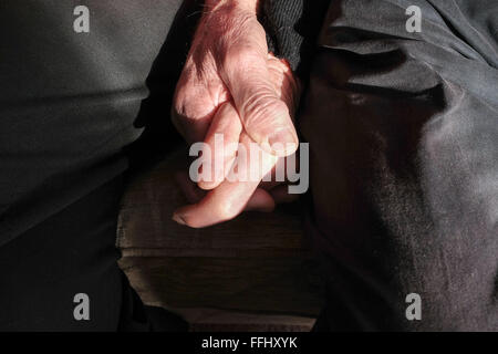 Elderly couple male and female holding hands still in love close up Stock Photo