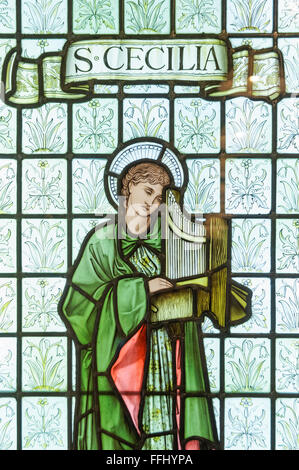 Saint Cecilia, the patron saint of music. Stained glass in William Morris Gallery, London England United Kingdom UK Stock Photo