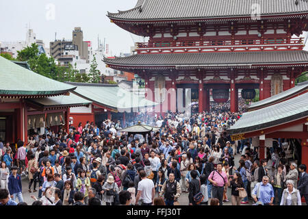 TOKYO, JAPAN -MAY 2: Crowd of japanese people walking around the most famous Sensoji buddhist temple, 2014 in Tokyo, Japan. The Stock Photo