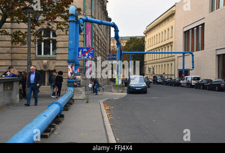 Blue pipes used to pump underground water from a construction site in Berlin, Germany. Stock Photo