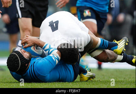 Rome, Italy. 14th Feb, 2016. Italy's Edoardo Gori, left, and England's Courtney Lawes fight for the ball during the Six Nations rugby union international match between Italy and England . Where England beats Italy at 40-9 score at Rome's Olympic Stadium Credit:  Riccardo De Luca/Pacific Press/Alamy Live News Stock Photo