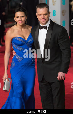 London, UK. 14 February 2016. Actor Matt Damon with wife Luciana Barroso. Red carpet arrivals for the 69th EE British Academy Film Awards, BAFTAs, at the Royal Opera House. Credit:  Vibrant Pictures/Alamy Live News Stock Photo