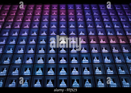 The Ruriden memorial hall at the Koukoko-ji temple on February 11, 2016 in Tokyo, Japan. In a country with an ageing population and a premium on space it is a modern collective tomb. Inside the hexagonal mausoleum there are over 2000 glass Buddhas lit by LED lights. Behind the Buddhas are compartments to store the ashes of the deceased. The light display changes color and pattern according to the season and time, and using a card reader system visitors can touch their card and display will change to indicate the Buddha representing their deceased. © Martin Hladik/AFLO/Alamy Live News Stock Photo