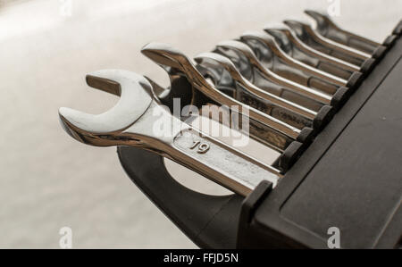 DIY Set of chrome metal home spanners. The wrenches are of various sizes with large copy space area for construction or repair c Stock Photo