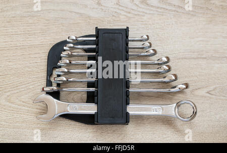 DIY Set of chrome metal home spanners. The wrenches are of various sizes with large copy space area for construction or repair c Stock Photo