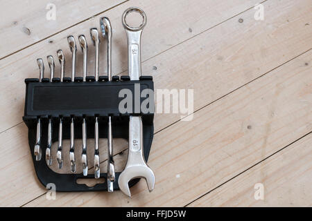 DIY Set of chrome metal home spanners. The wrenches are of various sizes with large copy space area for construction or repair c Stock Photo