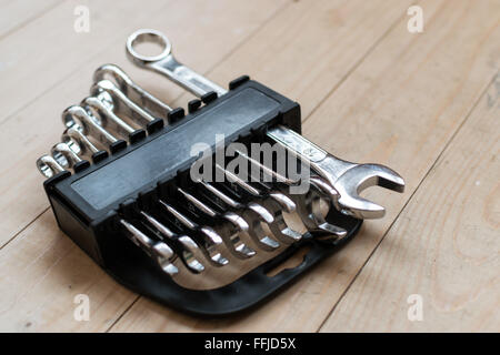 DIY Set of chrome metal home spanners. The wrenches are of various sizes with large copy space area for construction or repair c Stock Photo