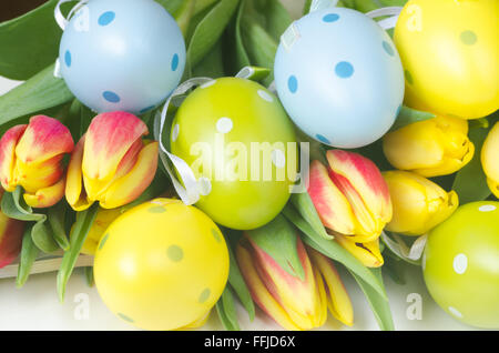 composition on easter flowers and eggs Stock Photo
