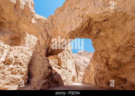 A rock arch in Natural Bridge Canyon, Death Valley National Park, California Stock Photo