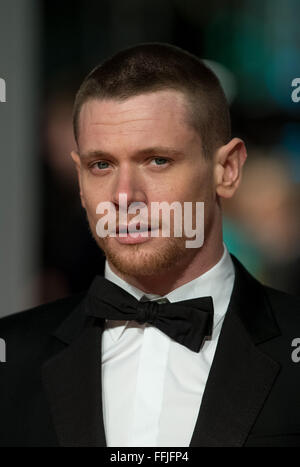 Jack O'Connell arrives on the red carpet for the EE BRITISH ACADEMY