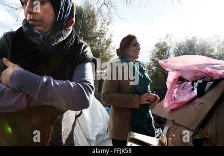 Refugees wait to change her wet clothes in Platanos camp, after having crossed the 7,5 miles of sea between the Turkish coast an Stock Photo
