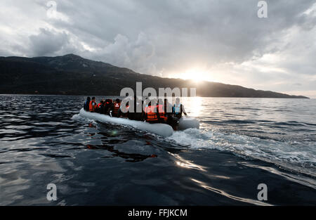 Refugee boat crosses the 7,5 miles of sea between the Turkish coast and the island of Lesvos arriving in Scala Sycamnias. Stock Photo