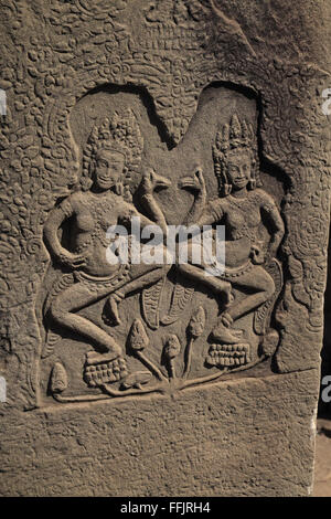 Base relief of dancers, Bayon temple, Angkor Thom, near Siem Reap, Cambodia, Asia. Stock Photo