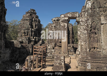 Huge stone faces on the towers of Bayon temple, Angkor Thom, near Siem Reap, Cambodia, Asia. Stock Photo