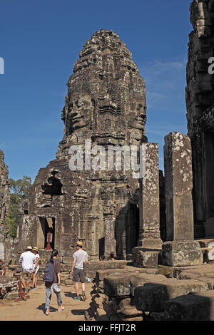 Huge stone faces on the towers of Bayon temple, Angkor Thom, near Siem Reap, Cambodia, Asia. Stock Photo