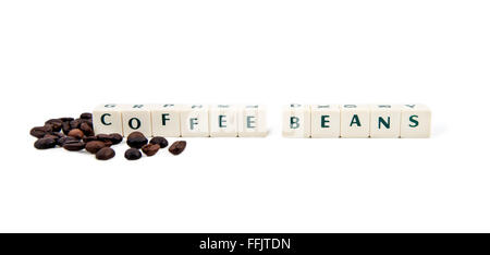 COFFEE BEANS white cube text on white background AND coffee beans Stock Photo