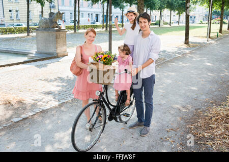 Family with two children and bicycle Stock Photo