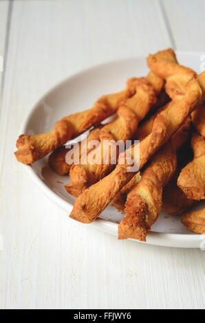 Cheese sticks with puff pastry and cheddar cheese Stock Photo