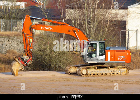 Kallinge, Sweden- February 07, 2016: Hitachi Zaxis 250 lcn crawler excavator at work at a construction site. Stock Photo