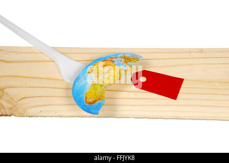 The red tag with torn fragment of a map on the background of wood Stock Photo