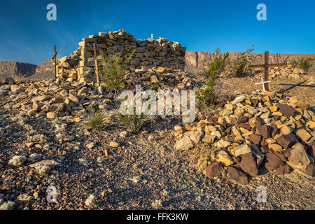 Graves and ruins at Terlingua Abaja ghost town, Santa Elena Canyon in distance, Chihuahuan Desert, Big Bend National Park, Texas Stock Photo