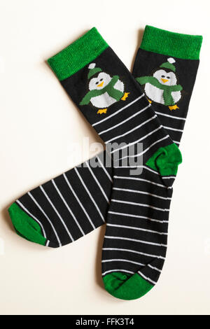 Christmas socks with penguins on isolated on white background Stock Photo