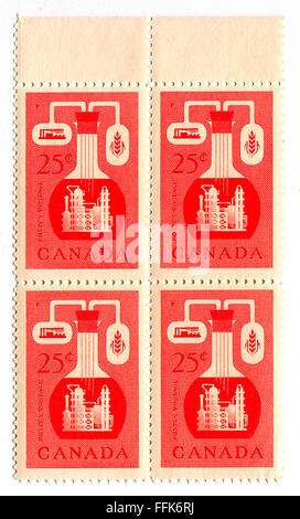 A stamp printed in CANADA  shows image of the Chemical Industry in Canada, circa 1960. Stock Photo