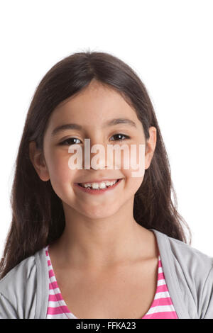 Eight year old girl shy and embarrassed Stock Photo - Alamy