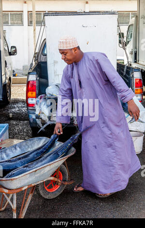 Fresh Fish Being Unloaded At The Fish Market, Muttrah, Muscat, Sultanate Of Oman Stock Photo