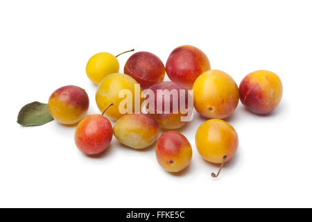 Fresh ripe mirabelle plums on white background Stock Photo