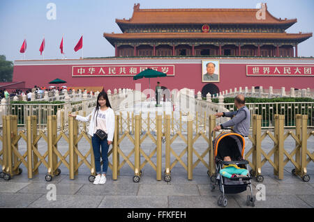 Chinese tourist poses for photo in Tiananmen Square, Beijing in September 2015 shortly after China Victory Day Parade Stock Photo