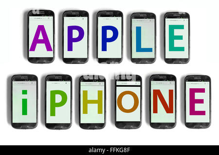 Apple iPhone written on the screens of smartphones photographed against a white background. Stock Photo