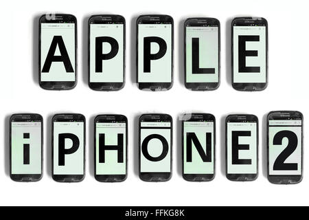 Apple iPhone 2 written on the screens of smartphones photographed against a white background. Stock Photo