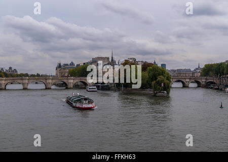 Bateau Mouche excursion boat on the Seine river, Ile de la Cite, Paris, France Stock Photo