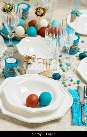 Decoration Easter table setting in blue tones. Selective focus. Stock Photo