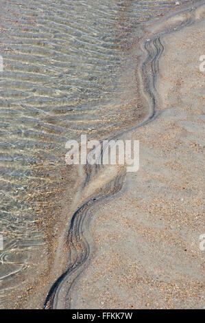 tidal pool ripples and waves on beach shoreline Stock Photo - Alamy