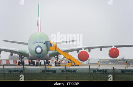 Hamburg, Germany. 12th Feb, 2016. An Airbus A380 aeroplane outside a factory in Hamburg, Germany, 12 February 2016. PHOTO: LUKAS SCHULZE/DPA/Alamy Live News Stock Photo