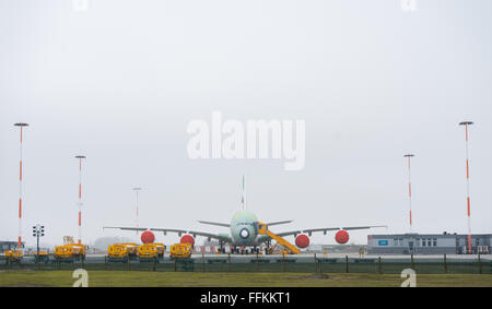 Hamburg, Germany. 12th Feb, 2016. An Airbus A380 aeroplane outside a factory in Hamburg, Germany, 12 February 2016. PHOTO: LUKAS SCHULZE/DPA/Alamy Live News Stock Photo