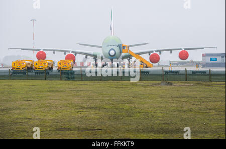 Hamburg, Germany. 12th Feb, 2016. An Airbus A380 aeroplane outside a factory in Hamburg, Germany, 12 February 2016. PHOTO: LUKAS SCHULZE/DPA/Alamy Live News Stock Photo