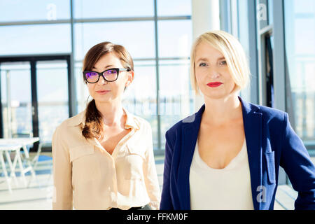 Portrait of two female architects in modern office Stock Photo