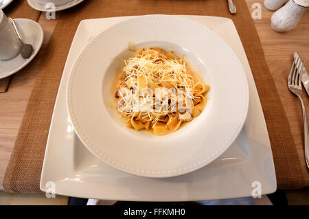 tasty spaghetti with meat on the plate close-up photo Stock Photo