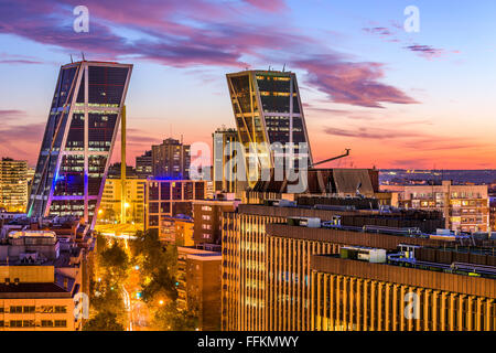 Madrid, Spain financial district skyline at twilight viewed towards the Gates of Europe. Stock Photo