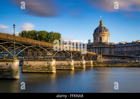 Evening view over Acadamie Francaise, Pont des Arts and River Seine, Paris France Stock Photo