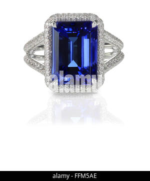 Large emerald cut sapphire blue  engagement cocktail fashion ring with halo setting and pave diamonds Stock Photo