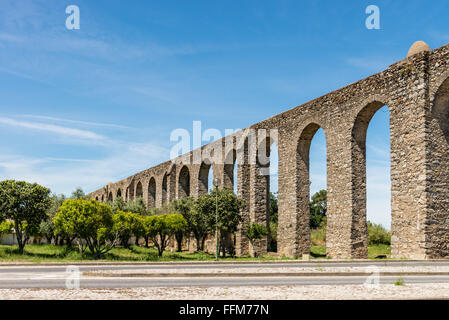 Ancient Roman aqueduct located in Evora, Portugal. Stock Photo