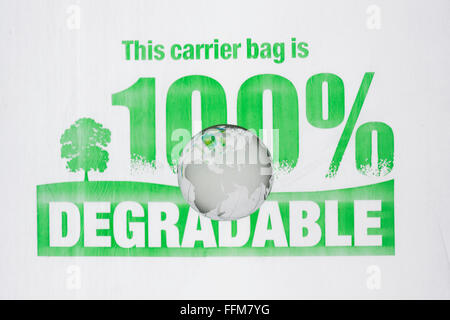 Glass Globe showing europe, africa and asia on a 100% Degradable carrier bag logo Stock Photo