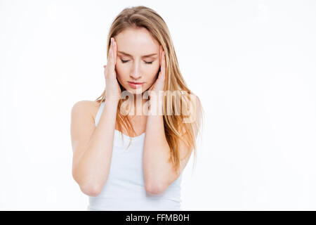 Young woman having headache isolated on a white background Stock Photo